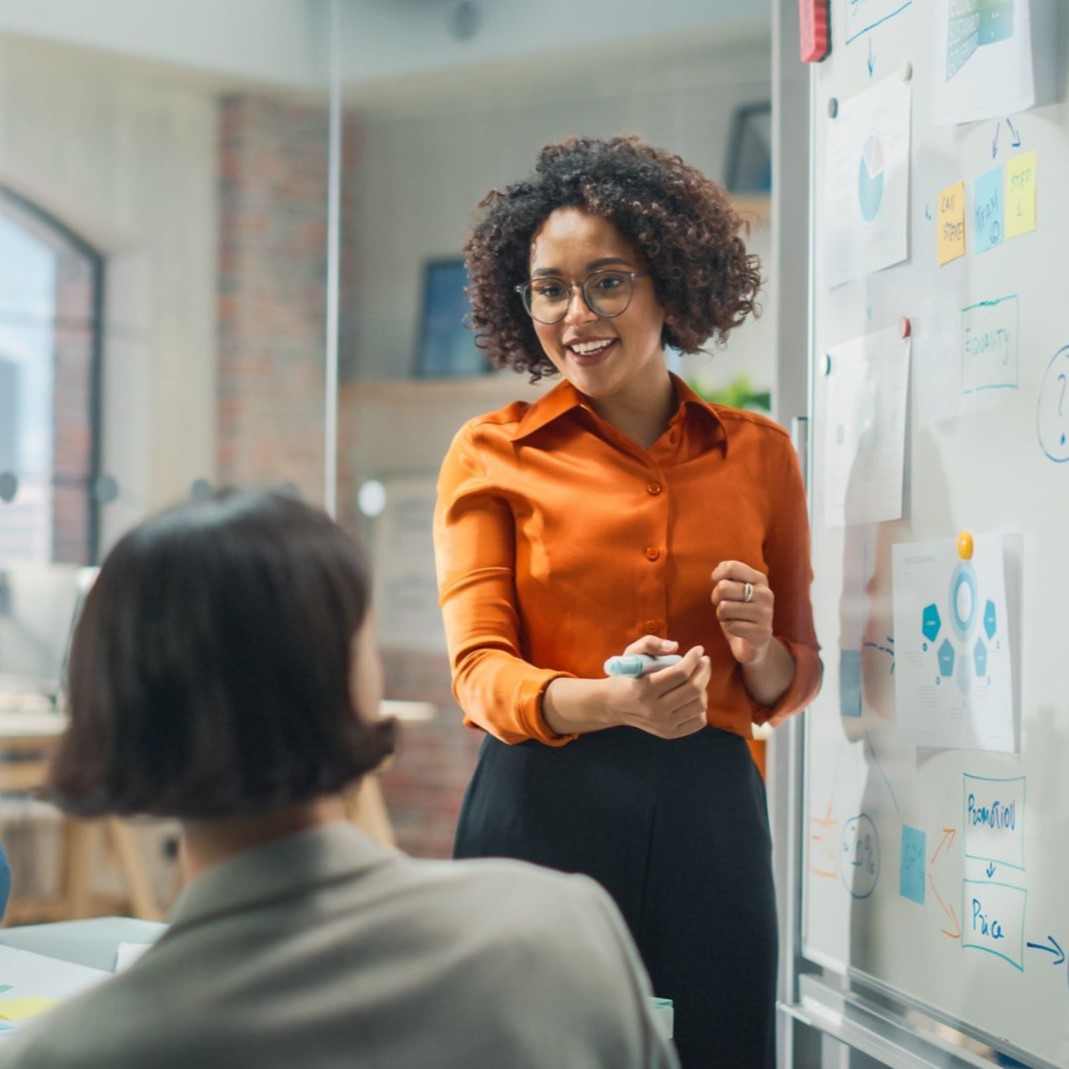 two women checking cloud machines
